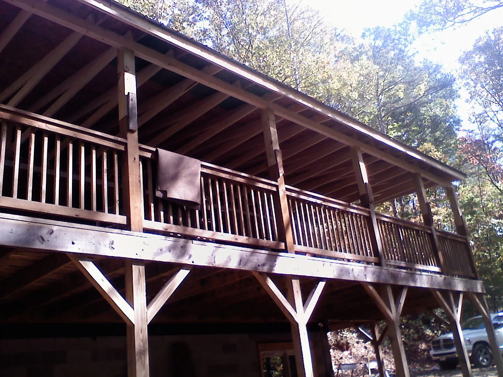 Timber framing under a new elevated porch and deck — Roof Leak Repair in Wardensville by Roofing Brothers